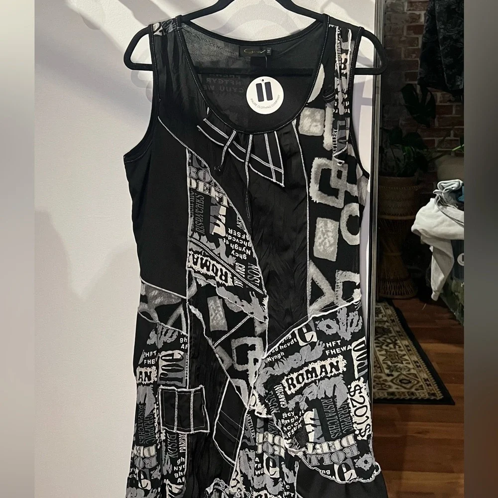 Newspaper dress with black and white patchwork layers - Picture 1 of 10